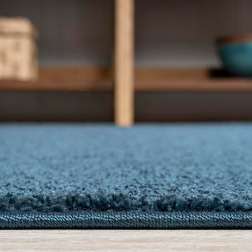 Haze Solid Low-pile Area Rug Navy